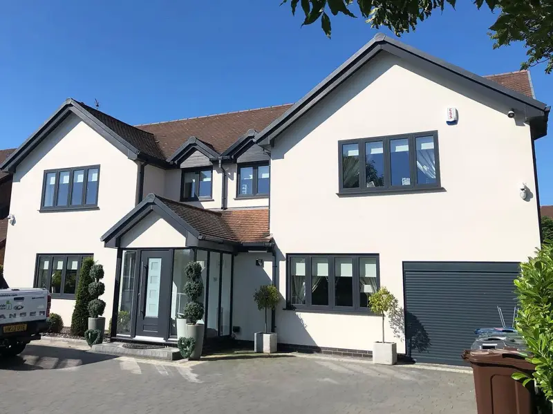 Detached house finished in white render