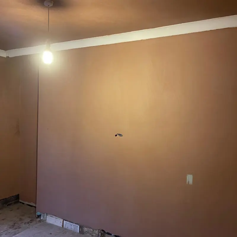Living room walls and ceiling skimmed to a flat, smooth finish