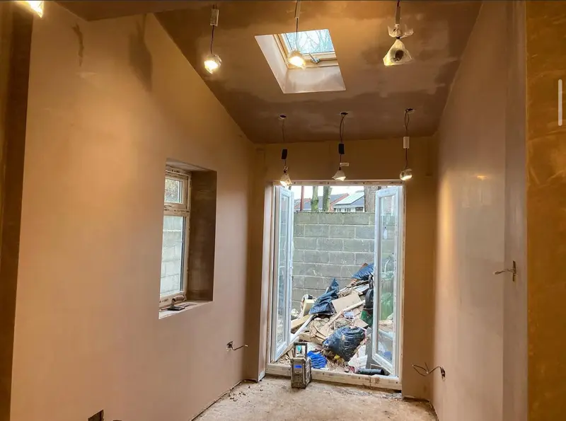 Front room with bay window replastered from floor to ceiling