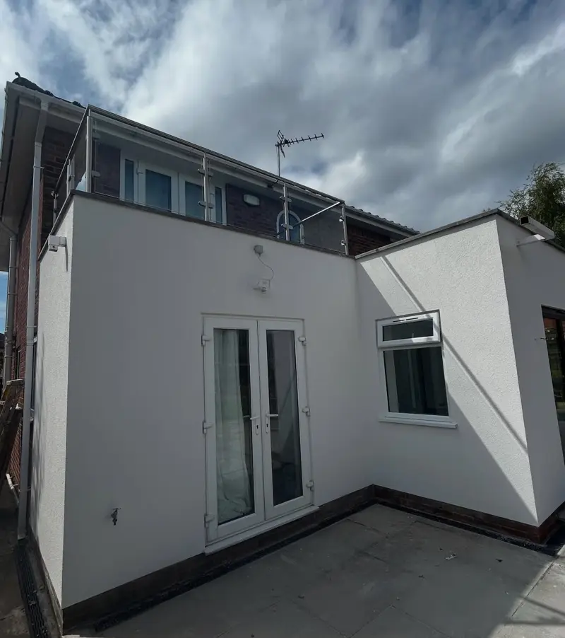 Rear extension finished in a clean white render