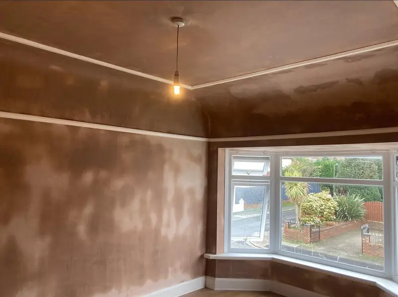 Front room with bay window replastered from floor to ceiling