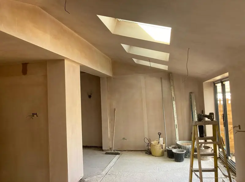 New extension boarded and plastered, ready for decoration