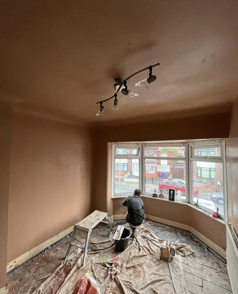 Front room with bay window replastered from floor to ceiling
